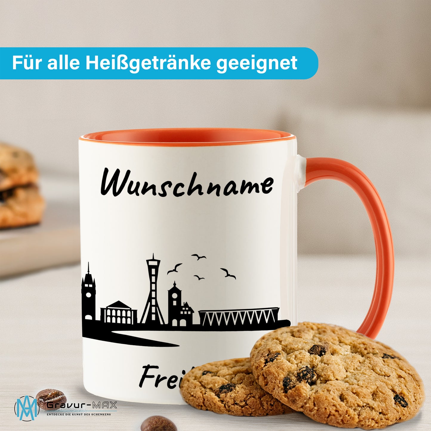 Tasse in Orange 330ml bedruckt mit der Skyline von Freiburg personalisierbar mit Wunschname