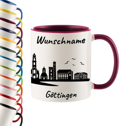Tasse in Bordeauxrot 330ml bedruckt mit der Skyline von Göttingen personalisierbar mit Wunschname