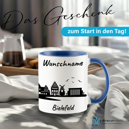 Tasse in Cambridge Blau 330ml bedruckt mit der Skyline von Bielefeld personalisierbar mit Wunschname