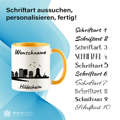 Tasse in Goldgelb 330ml bedruckt mit der Skyline von Hildesheim personalisierbar mit Wunschname
