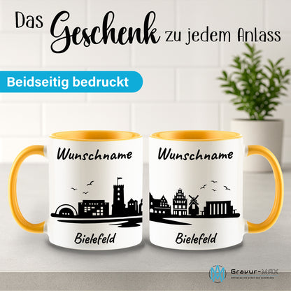 Tasse in Goldgelb 330ml bedruckt mit der Skyline von Bielefeld personalisierbar mit Wunschname