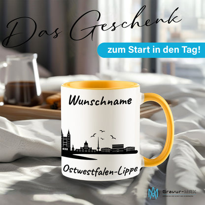 Tasse in Goldgelb 330ml bedruckt mit der Skyline von Ostwestfalen-Lippe personalisierbar mit Wunschname