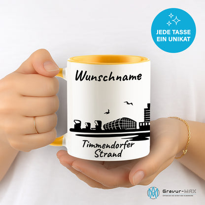 Tasse in Goldgelb 330ml bedruckt mit der Skyline von Timmendorfer Strand personalisierbar mit Wunschname