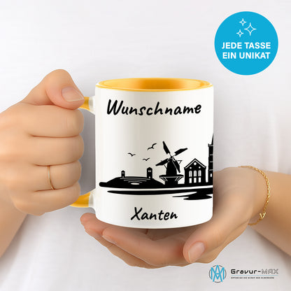 Tasse in Goldgelb 330ml bedruckt mit der Skyline von Xanten personalisierbar mit Wunschname