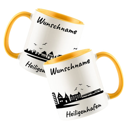 Tasse in Goldgelb 330ml bedruckt mit der Skyline von Heiligenhafen personalisierbar mit Wunschname