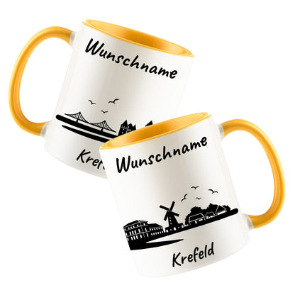 Tasse in Goldgelb 330ml bedruckt mit der Skyline von Krefeld personalisierbar mit Wunschname