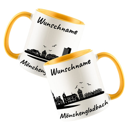Tasse in Goldgelb 330ml bedruckt mit der Skyline von Mönchengladbach personalisierbar mit Wunschname