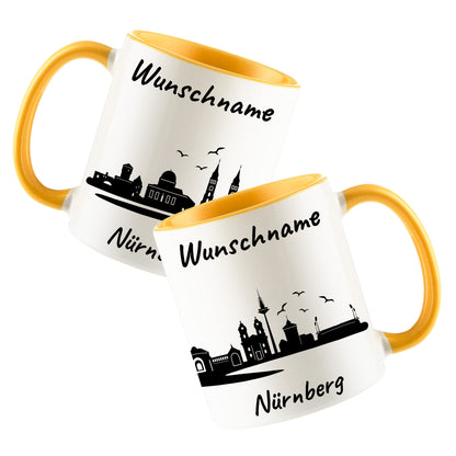Tasse in Goldgelb 330ml bedruckt mit der Skyline von Nürnberg personalisierbar mit Wunschname