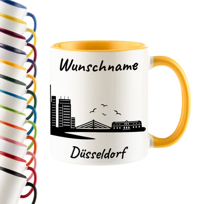 Tasse in Goldgelb 330ml bedruckt mit der Skyline von Düsseldorf personalisierbar mit Wunschname