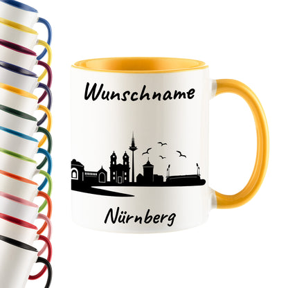 Tasse in Goldgelb 330ml bedruckt mit der Skyline von Nürnberg personalisierbar mit Wunschname
