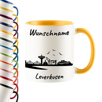 Tasse in Goldgelb 330ml bedruckt mit der Skyline von Leverkusen personalisierbar mit Wunschname