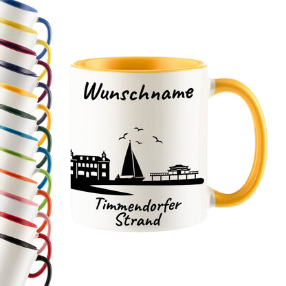 Tasse in Goldgelb 330ml bedruckt mit der Skyline von Timmendorfer Strand personalisierbar mit Wunschname