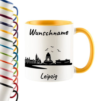 Tasse in Goldgelb 330ml bedruckt mit der Skyline von Leipzig personalisierbar mit Wunschname