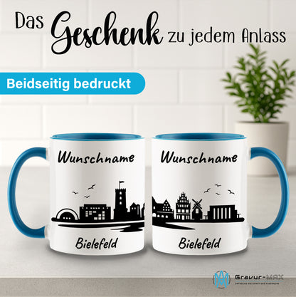 Tasse in Hellblau 330ml bedruckt mit der Skyline von Bielefeld personalisierbar mit Wunschname