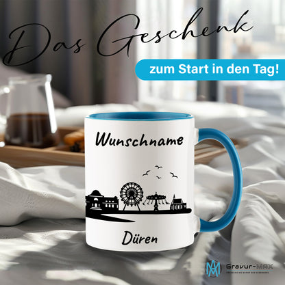 Tasse in Hellblau 330ml bedruckt mit der Skyline von Düren personalisierbar mit Wunschname