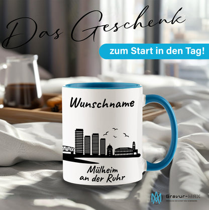 Tasse in Hellblau 330ml bedruckt mit der Skyline von Mülheim an der Ruhr personalisierbar mit Wunschname