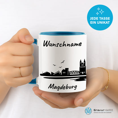 Tasse in Hellblau 330ml bedruckt mit der Skyline von Magdeburg personalisierbar mit Wunschname