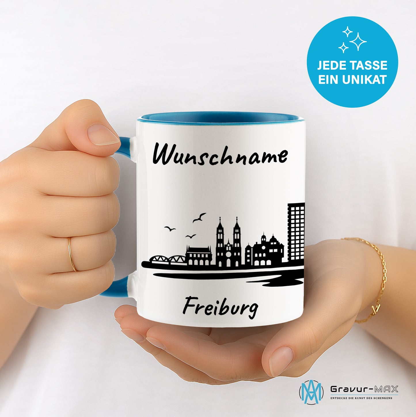 Tasse in Hellblau 330ml bedruckt mit der Skyline von Freiburg personalisierbar mit Wunschname