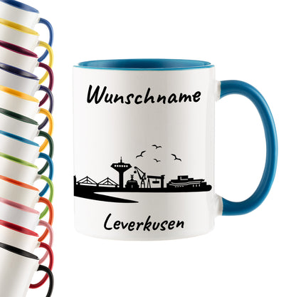 Tasse in Hellblau 330ml bedruckt mit der Skyline von Leverkusen personalisierbar mit Wunschname