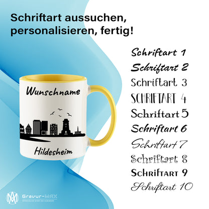 Tasse in Hellgelb 330ml bedruckt mit der Skyline von Hildesheim personalisierbar mit Wunschname