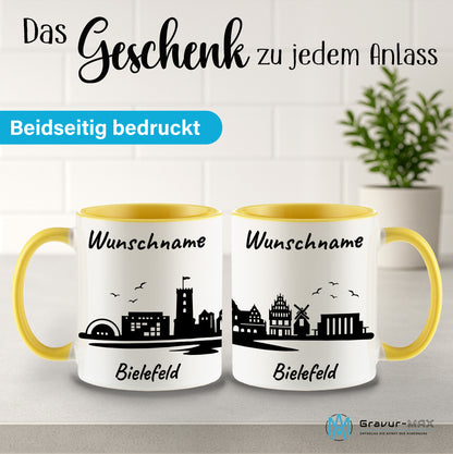 Tasse in Hellgelb 330ml bedruckt mit der Skyline von Bielefeld personalisierbar mit Wunschname