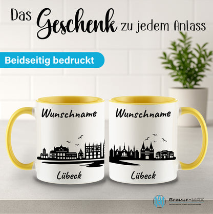 Tasse in Hellgelb 330ml bedruckt mit der Skyline von Lübeck personalisierbar mit Wunschname