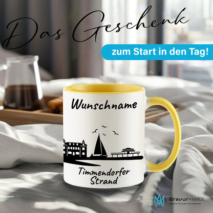Tasse in Hellgelb 330ml bedruckt mit der Skyline von Timmendorfer Strand personalisierbar mit Wunschname