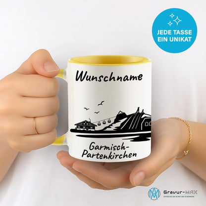 Tasse in Hellgelb 330ml bedruckt mit der Skyline von Garmisch-Partenkirchen personalisierbar mit Wunschname