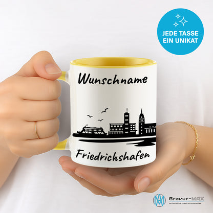 Tasse in Hellgelb 330ml bedruckt mit der Skyline von Friedrichshafen personalisierbar mit Wunschname
