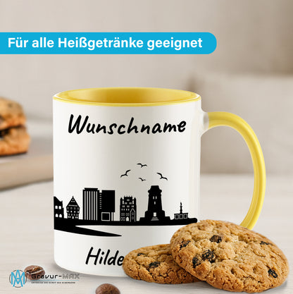 Tasse in Hellgelb 330ml bedruckt mit der Skyline von Hildesheim personalisierbar mit Wunschname