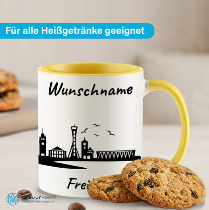 Tasse in Hellgelb 330ml bedruckt mit der Skyline von Freiburg personalisierbar mit Wunschname