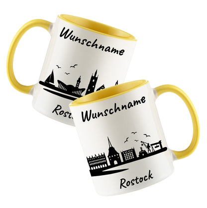 Tasse in Hellgelb 330ml bedruckt mit der Skyline von Rostock personalisierbar mit Wunschname