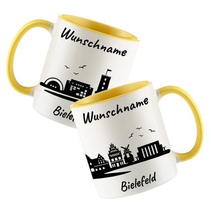 Tasse in Hellgelb 330ml bedruckt mit der Skyline von Bielefeld personalisierbar mit Wunschname