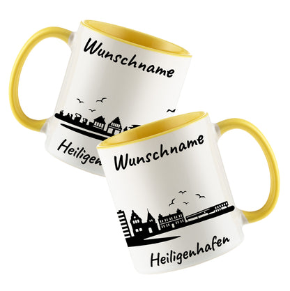 Tasse in Hellgelb 330ml bedruckt mit der Skyline von Heiligenhafen personalisierbar mit Wunschname