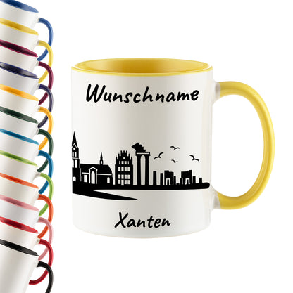 Tasse in Hellgelb 330ml bedruckt mit der Skyline von Xanten personalisierbar mit Wunschname