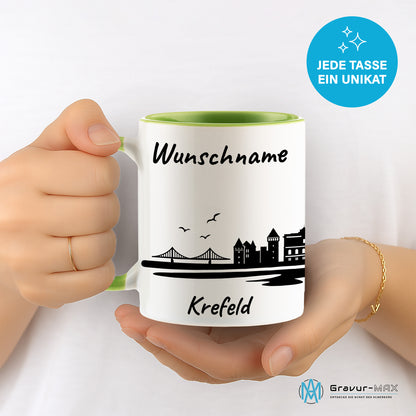 Tasse in Hellgrün 330ml bedruckt mit der Skyline von Krefeld personalisierbar mit Wunschname
