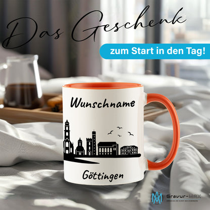 Tasse in Orange 330ml bedruckt mit der Skyline von Göttingen personalisierbar mit Wunschname