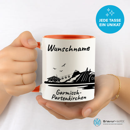 Tasse in Orange 330ml bedruckt mit der Skyline von Garmisch-Partenkirchen personalisierbar mit Wunschname