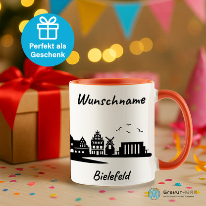 Tasse in Orange 330ml bedruckt mit der Skyline von Bielefeld personalisierbar mit Wunschname
