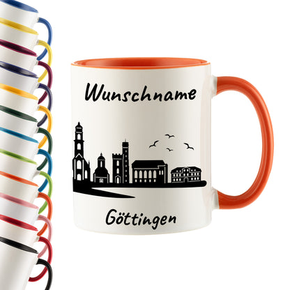 Tasse in Orange 330ml bedruckt mit der Skyline von Göttingen personalisierbar mit Wunschname