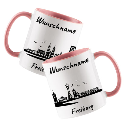 Tasse in Rosa 330ml bedruckt mit der Skyline von Freiburg personalisierbar mit Wunschname