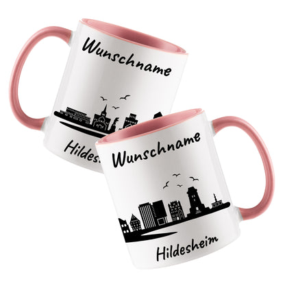 Tasse in Rosa 330ml bedruckt mit der Skyline von Hildesheim personalisierbar mit Wunschname