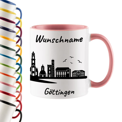 Tasse in Rosa 330ml bedruckt mit der Skyline von Göttingen personalisierbar mit Wunschname