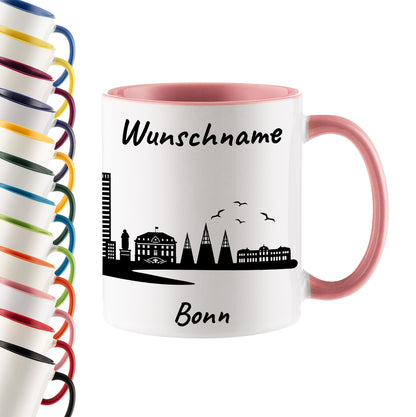 Tasse in Rosa 330ml bedruckt mit der Skyline von Bonn personalisierbar mit Wunschname