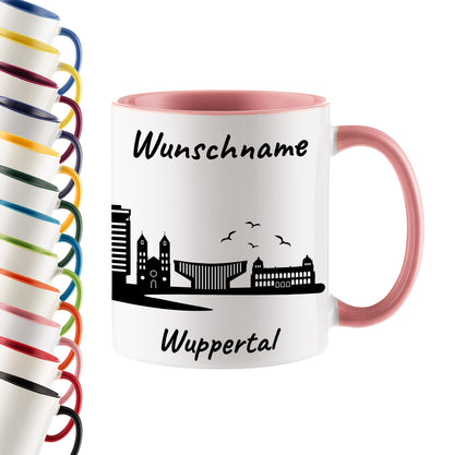 Tasse in Rosa 330ml bedruckt mit der Skyline von Wuppertal personalisierbar mit Wunschname