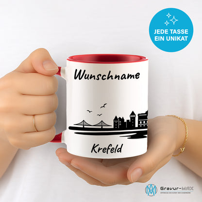 Tasse in Rot 330ml bedruckt mit der Skyline von Krefeld personalisierbar mit Wunschname
