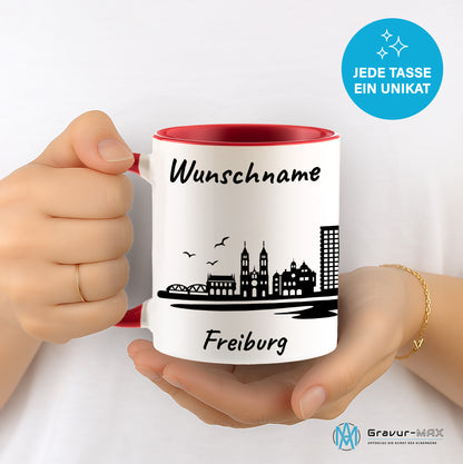 Tasse in Rot 330ml bedruckt mit der Skyline von Freiburg personalisierbar mit Wunschname