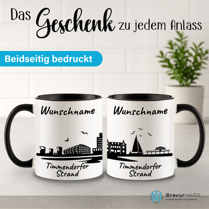 Tasse in Schwarz 330ml bedruckt mit der Skyline von Timmendorfer Strand personalisierbar mit Wunschname