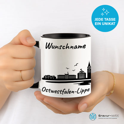 Tasse in Schwarz 330ml bedruckt mit der Skyline von Ostwestfalen-Lippe personalisierbar mit Wunschname