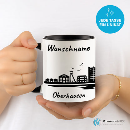 Tasse in Schwarz 330ml bedruckt mit der Skyline von Oberhausen personalisierbar mit Wunschname